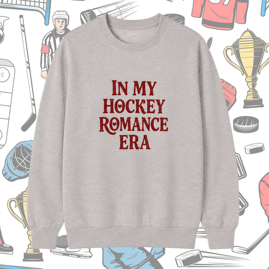 Gray sweatshirt with 'In My Hockey Romance Era' text on a sports-themed background
