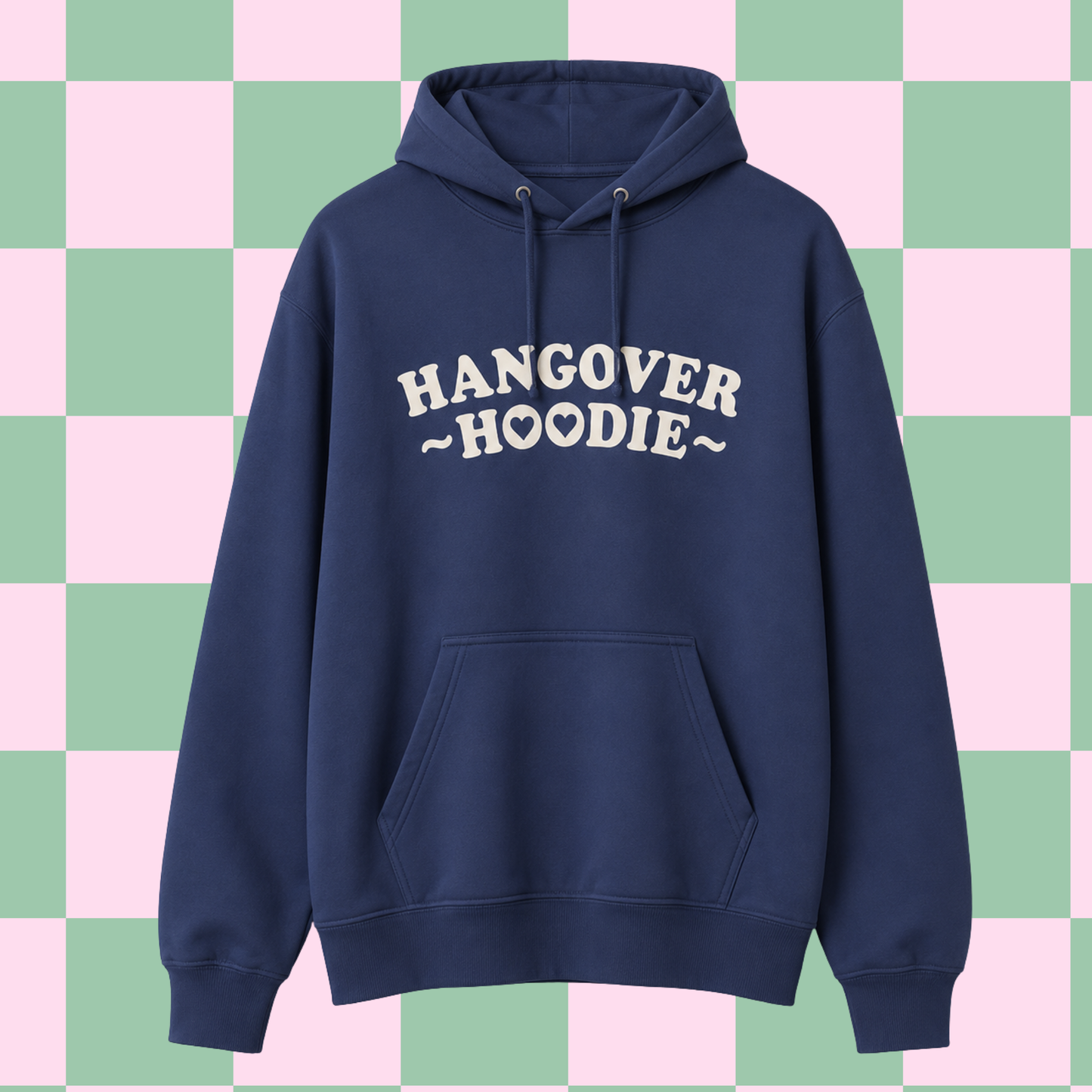 A navy blue pullover hoodie with 'HANGOVER HOODIE' printed in white across the chest, shown against a pink and green checkered background.