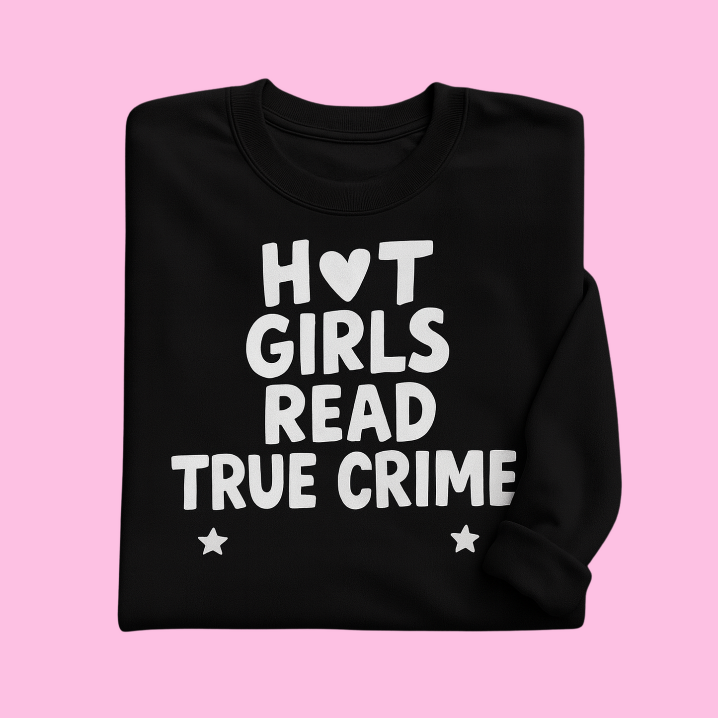 Folded black sweatshirt with bold white text “Hot Girls Read True Crime” and heart/star details, bookish fashion gift.