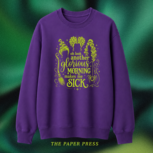 Purple sweater with hocus pocus themed slogan.