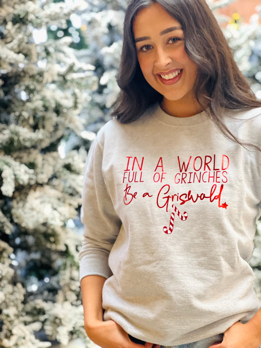 IN A WORLD FULL OF GRINCHES CHRISTMAS SWEATER