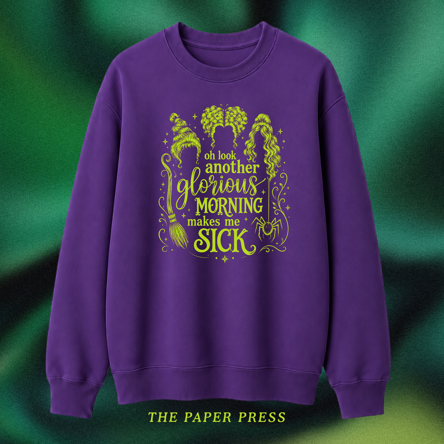 Purple sweater with hocus pocus themed slogan. 