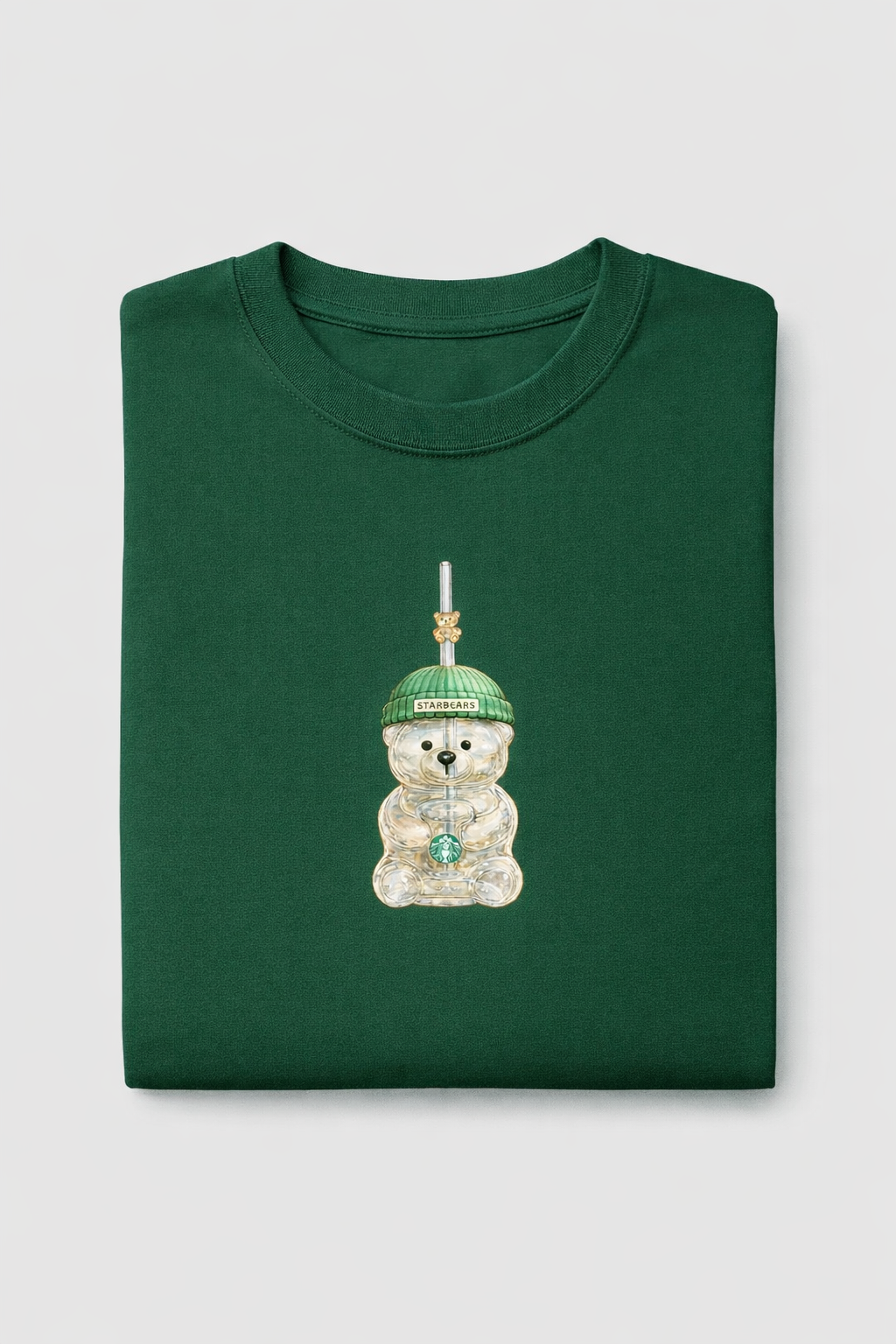 Bottle green folded t-shirt with small Starbears bear cup illustration printed at the centre of the chest